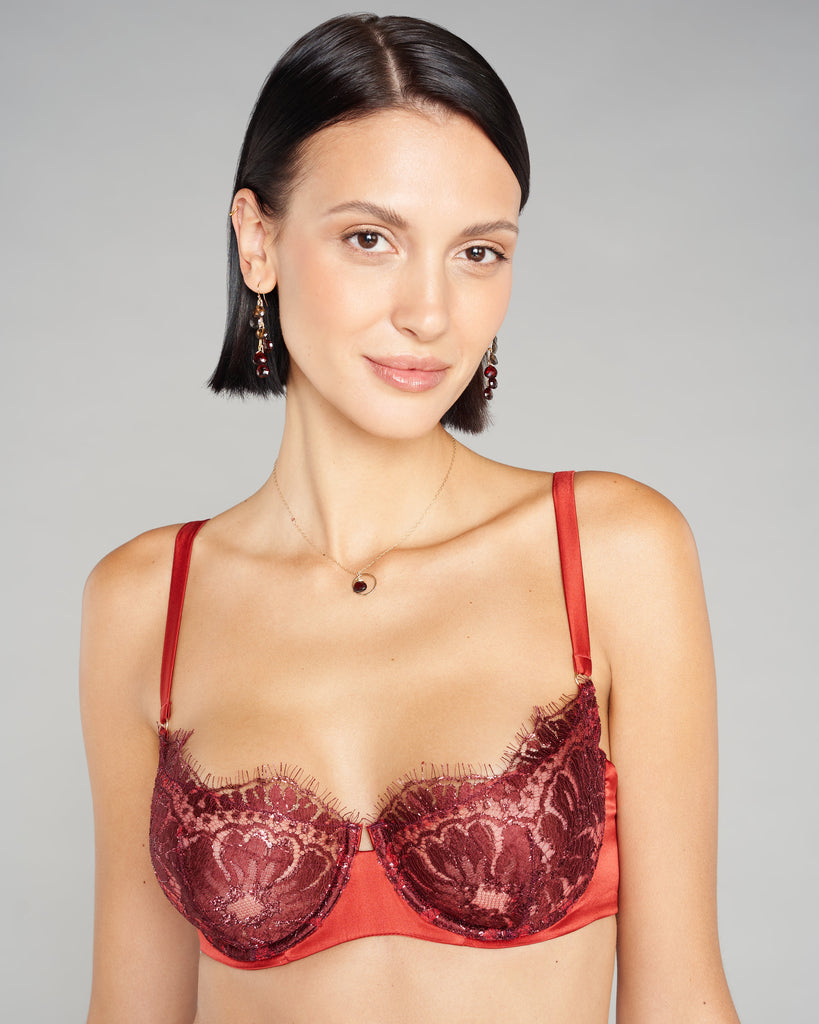 Underwired bra from Freolic London has transparent lace cups with silk tulle lining, adjustable silk shoulder straps, and adjustable silk back straps for fit