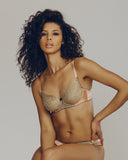 Gilda & Pearl underwired bra has gold lace cups and a silk band and straps