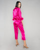 Gilda & Pearl’s Kitty Pajama is crafted from fuchsia silk with cropped sleeves and legs