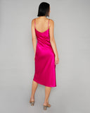 Curve hugging midi slip dress from Gilda & Pearl is crafted from a vibrant Hollywood Rose pink silk