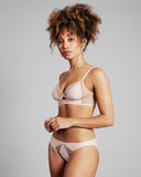 Matching Madame Aime bikini panty has an opaque microfiber body with sheer tulle detailing at the front; cotton-lined gusset