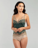 Forest green silk camisole from Merle Noir is accented with swaths of painstakingly appliqué champagne floral lace