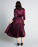 Vannina Vesperini Burgundy Schiap dress has a full silk skirt and hip fins